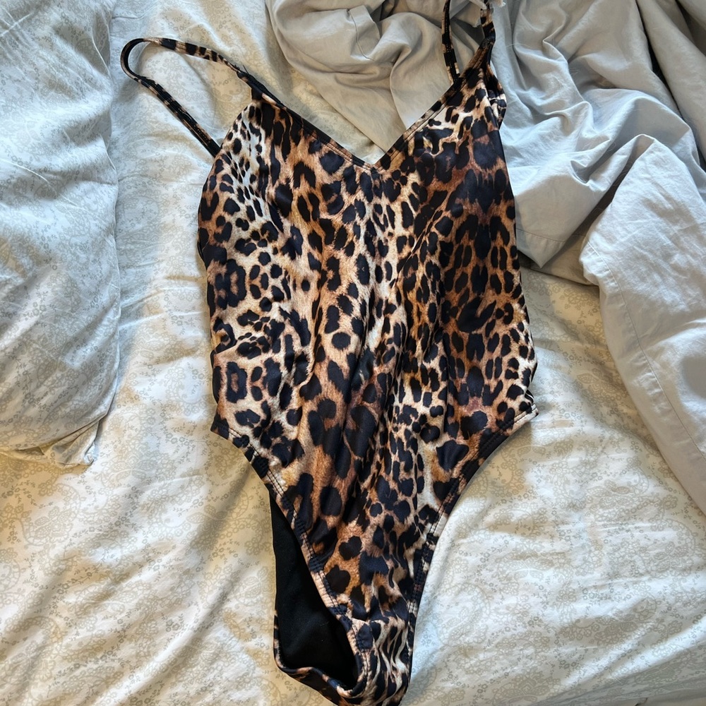 Never worn cheetah one piece